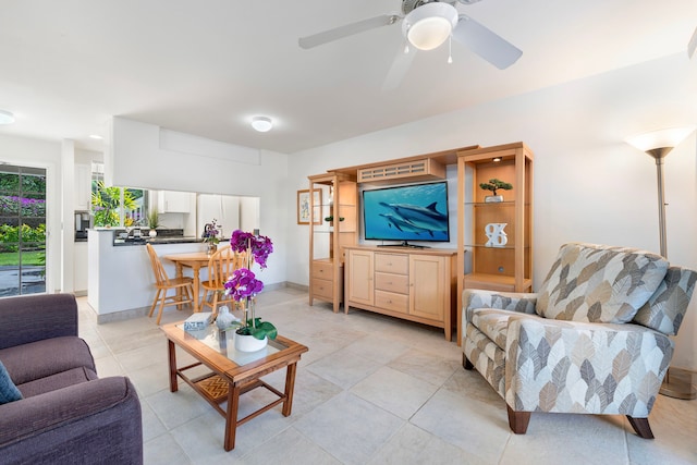 living room with ceiling fan