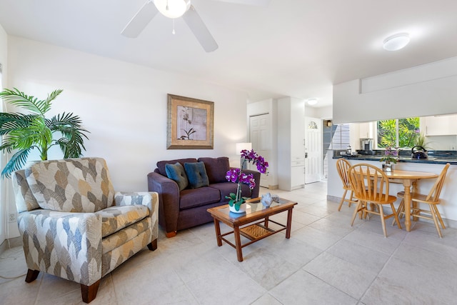 living room featuring ceiling fan