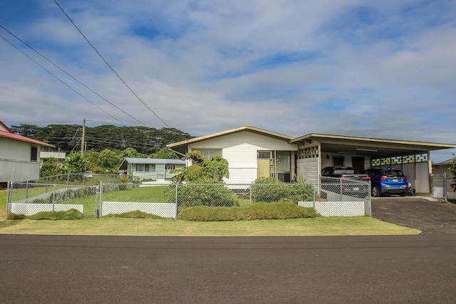 view of front of house with a carport