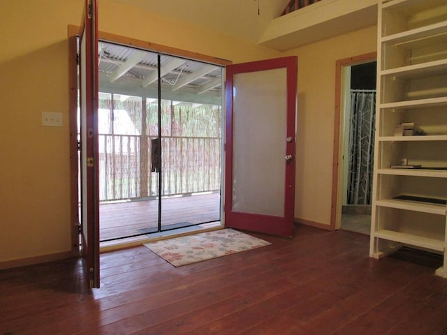 doorway to outside featuring dark hardwood / wood-style flooring