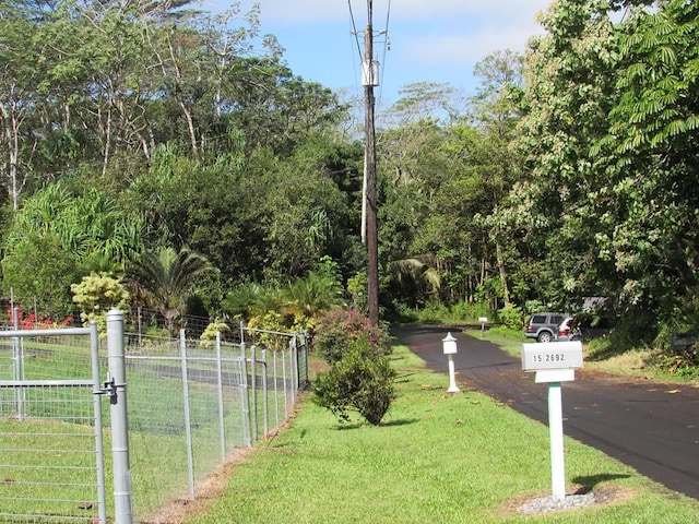 surrounding community featuring a lawn