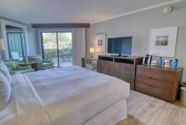 bedroom featuring access to exterior, crown molding, and light wood-type flooring