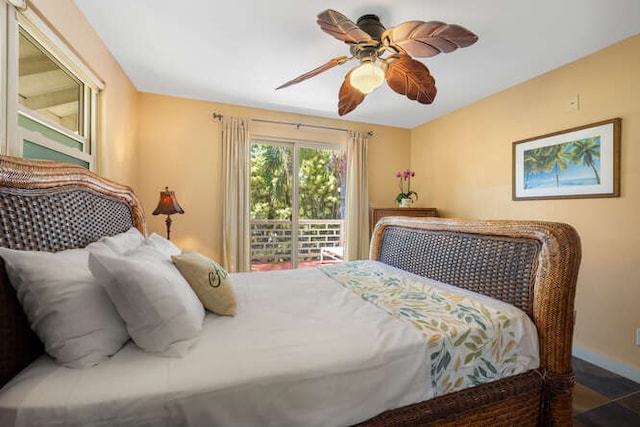 bedroom with access to exterior and ceiling fan