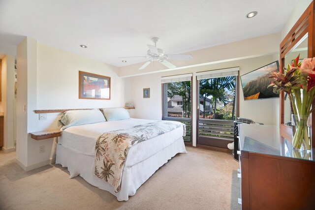 carpeted bedroom with ceiling fan and access to exterior