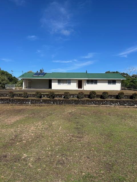 view of front of property with a front yard