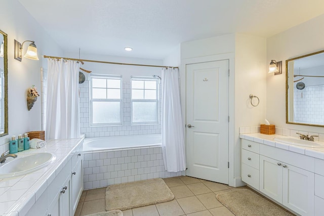 bathroom with tile patterned flooring, vanity, and shower / tub combo