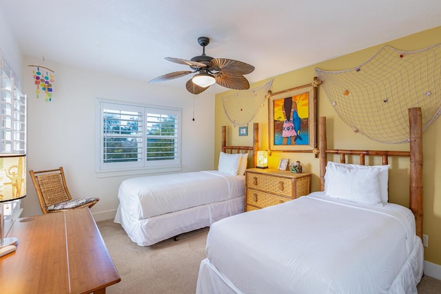 bedroom featuring ceiling fan and carpet floors