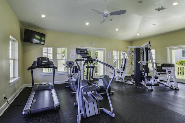 gym featuring ceiling fan and a healthy amount of sunlight