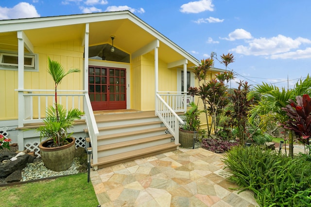 entrance to property with covered porch