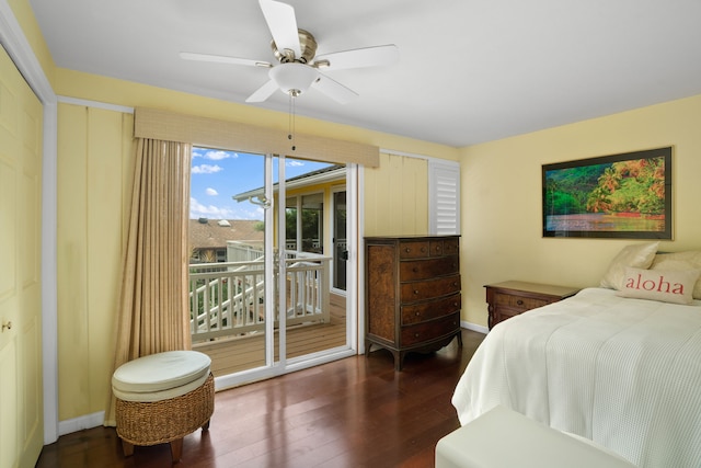 bedroom featuring ceiling fan, dark wood-type flooring, and access to outside