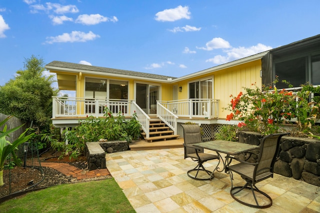 back of property with a patio area