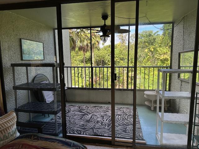 unfurnished sunroom featuring plenty of natural light