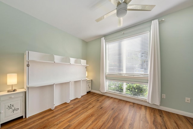 unfurnished bedroom with light hardwood / wood-style floors and ceiling fan