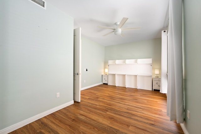 unfurnished bedroom featuring light hardwood / wood-style flooring and ceiling fan