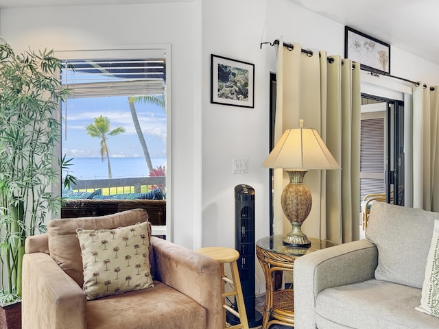 living area with a water view