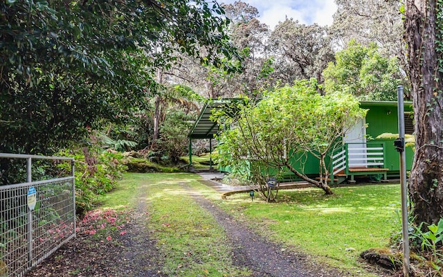 view of yard with a wooden deck