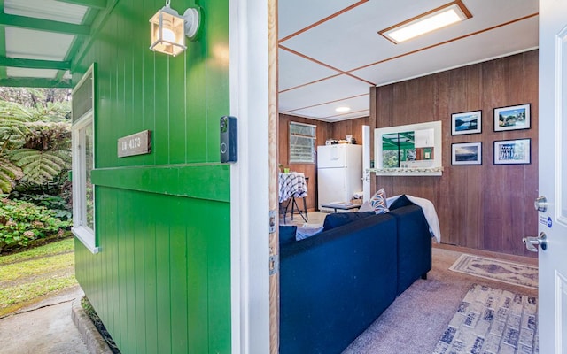 living room featuring wooden walls