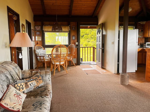 sunroom / solarium featuring beamed ceiling and wooden ceiling