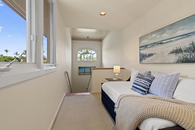 living area featuring light carpet and crown molding