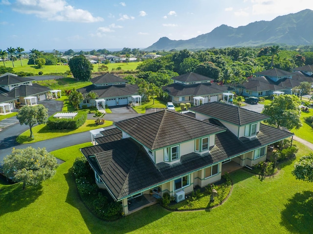 birds eye view of property featuring a mountain view