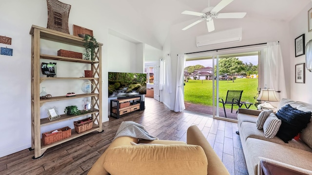 living room featuring a wall unit AC, ceiling fan, and vaulted ceiling