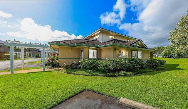 view of home's exterior with a lawn