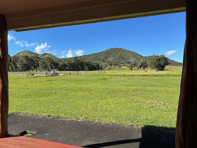 view of mountain feature with a rural view