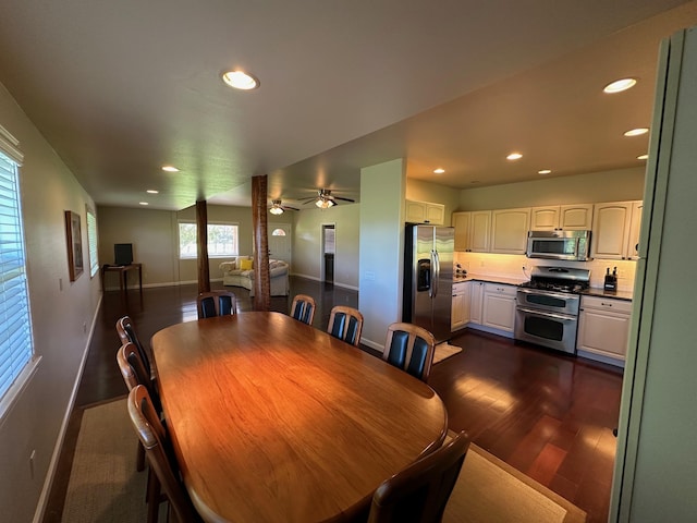 dining room featuring dark hardwood / wood-style floors and ceiling fan