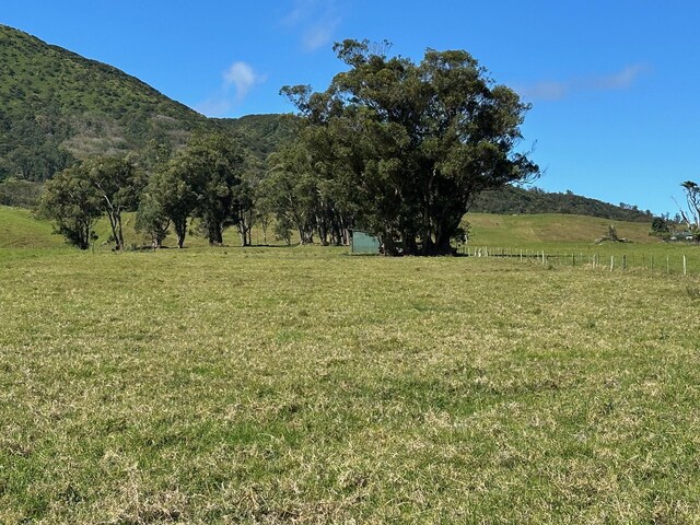 property view of mountains featuring a rural view