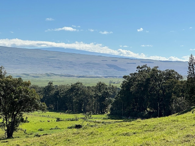 property view of mountains featuring a rural view