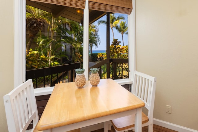 interior space with a healthy amount of sunlight and a water view