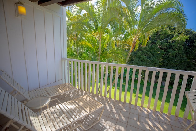 deck featuring a lawn