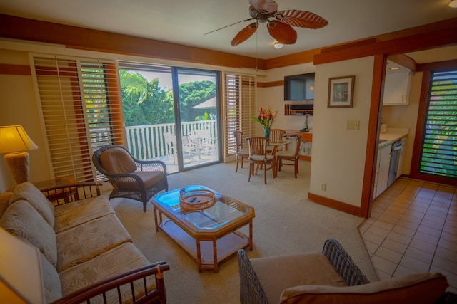 living room with ceiling fan and light tile patterned flooring