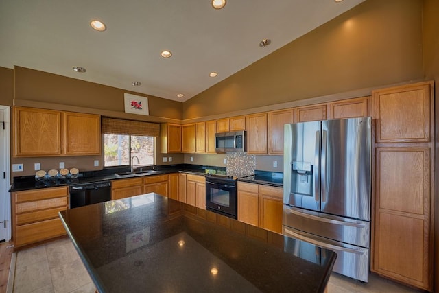 kitchen with black appliances, a kitchen island, lofted ceiling, and sink