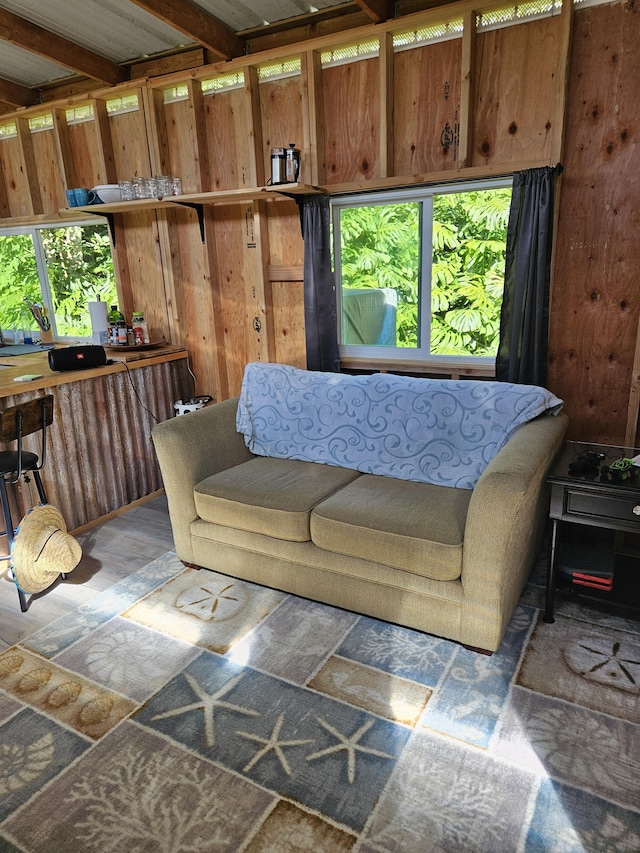 living room with beamed ceiling