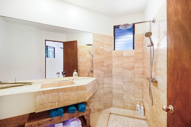 bathroom with tiled shower