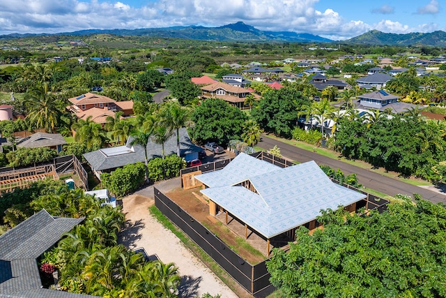 birds eye view of property with a mountain view