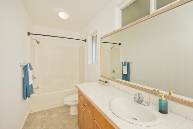 full bathroom featuring vanity, toilet, washtub / shower combination, and tile patterned flooring