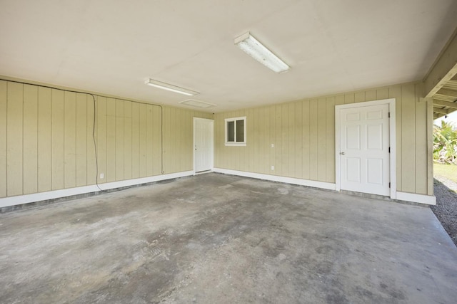 garage with baseboards