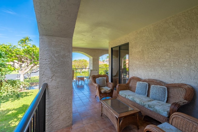 view of patio with a balcony