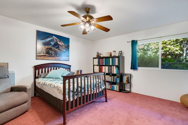 carpeted bedroom with ceiling fan