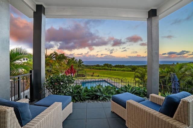 view of patio terrace at dusk