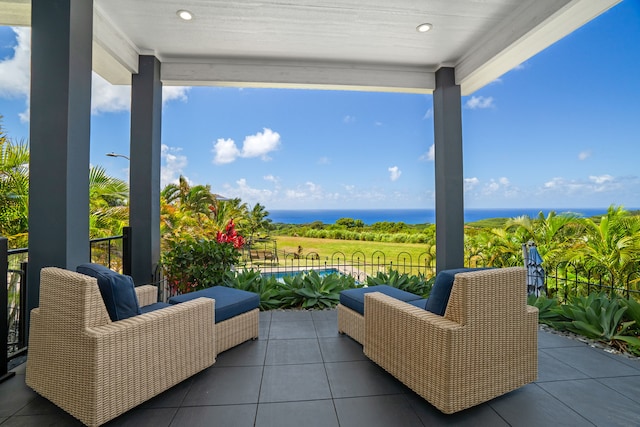 view of patio / terrace with a water view