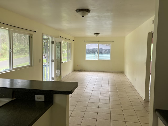 interior space with light tile patterned floors