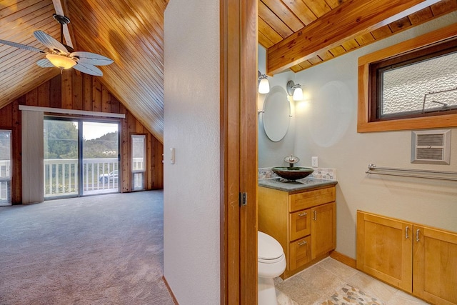 bathroom with vanity, wooden ceiling, lofted ceiling with beams, ceiling fan, and toilet