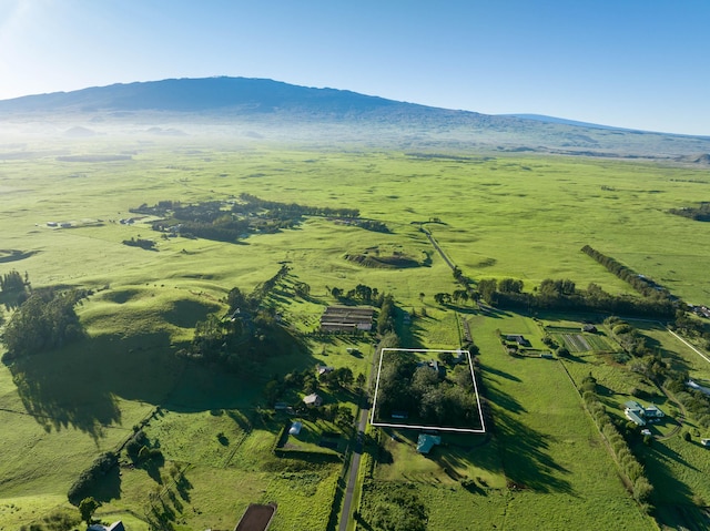 aerial view with a mountain view and a rural view