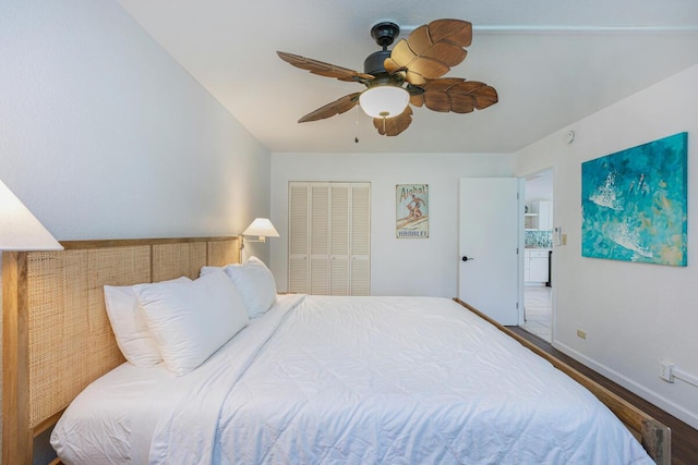 bedroom featuring hardwood / wood-style floors, ceiling fan, and a closet