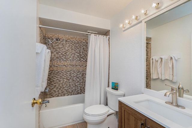 full bathroom with shower / bathtub combination with curtain, vanity, and toilet