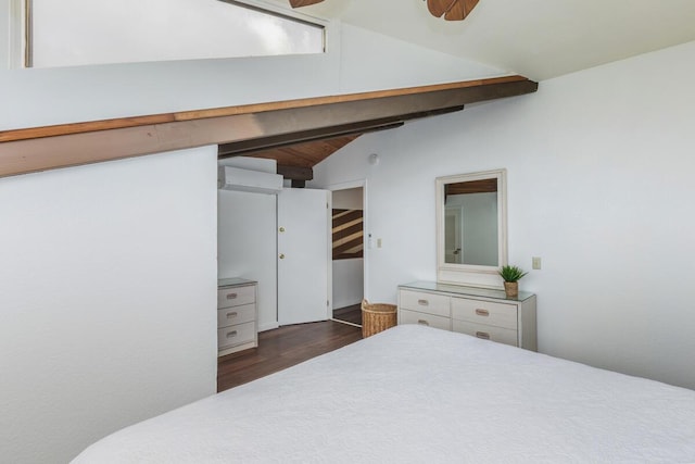 bedroom with dark wood-type flooring, ceiling fan, and lofted ceiling