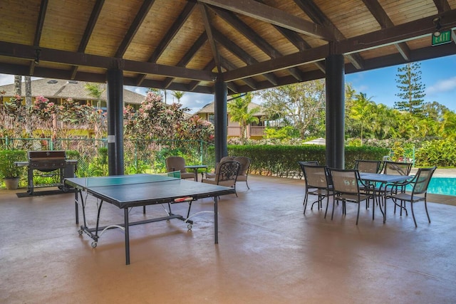 view of patio / terrace featuring a gazebo and a grill